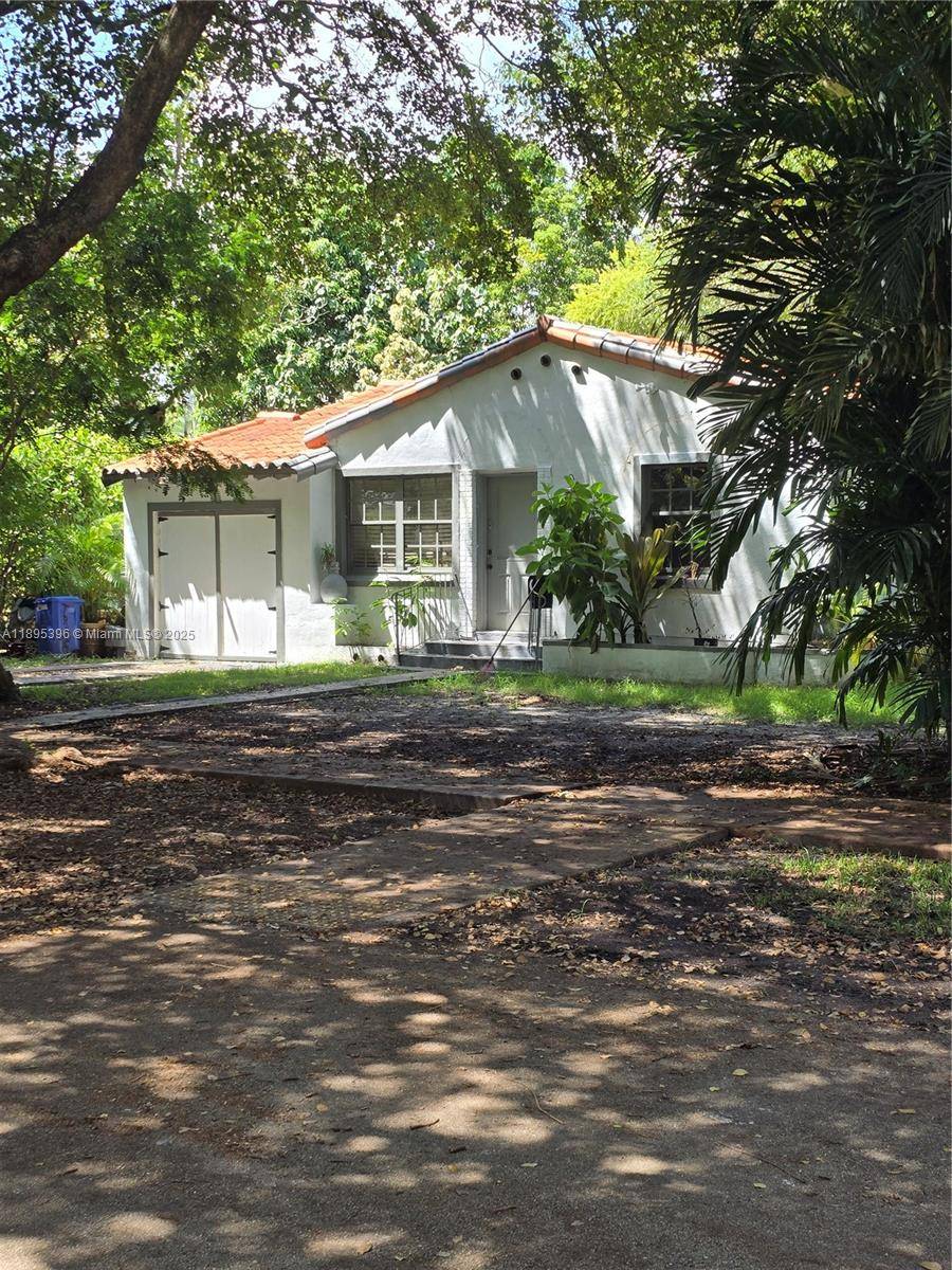 Mediterranean style Single family 3 bedroom, 2 bathroom home being sold with additional lot making the total land size 6600 sf.