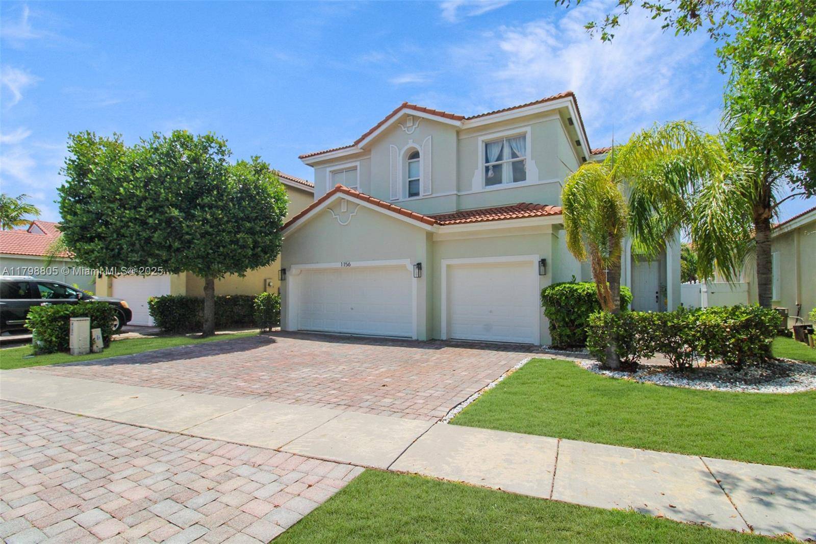 This lovely home is located in the desirable Waterstone gated community.