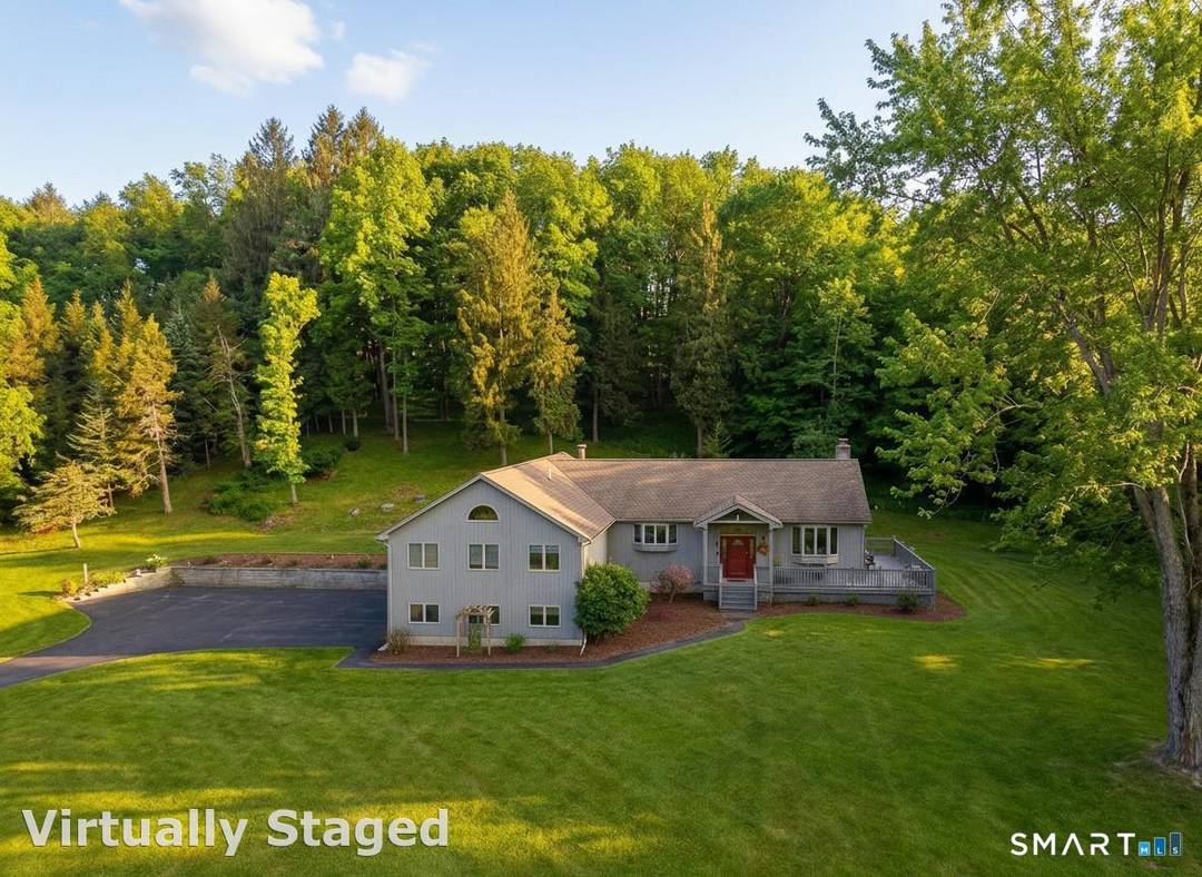 An incredible and rare opportunity awaits with this custom built expanded ranch set on an extraordinary 28 acre parcel, offering unmatched privacy, serenity, and timeless New England charm.