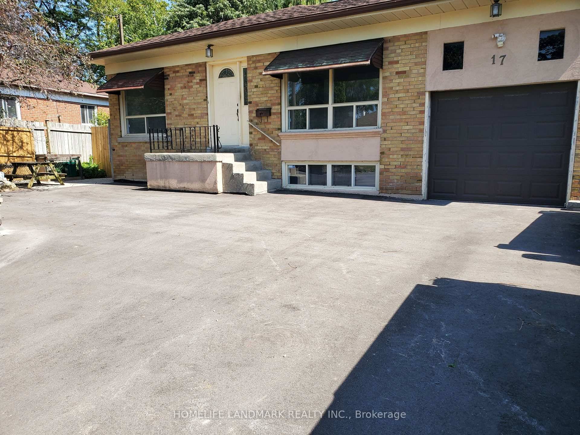 Welcome to this bright and spacious lower level home with a private entrance !