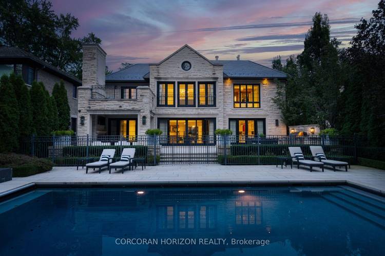 HOGGS HOLLOW'S CROWN ESTATE Privately tucked behind its own cul de sac and surrounded by mature, park like landscaping, this extraordinary custom estate offers over 10, 000 sq.