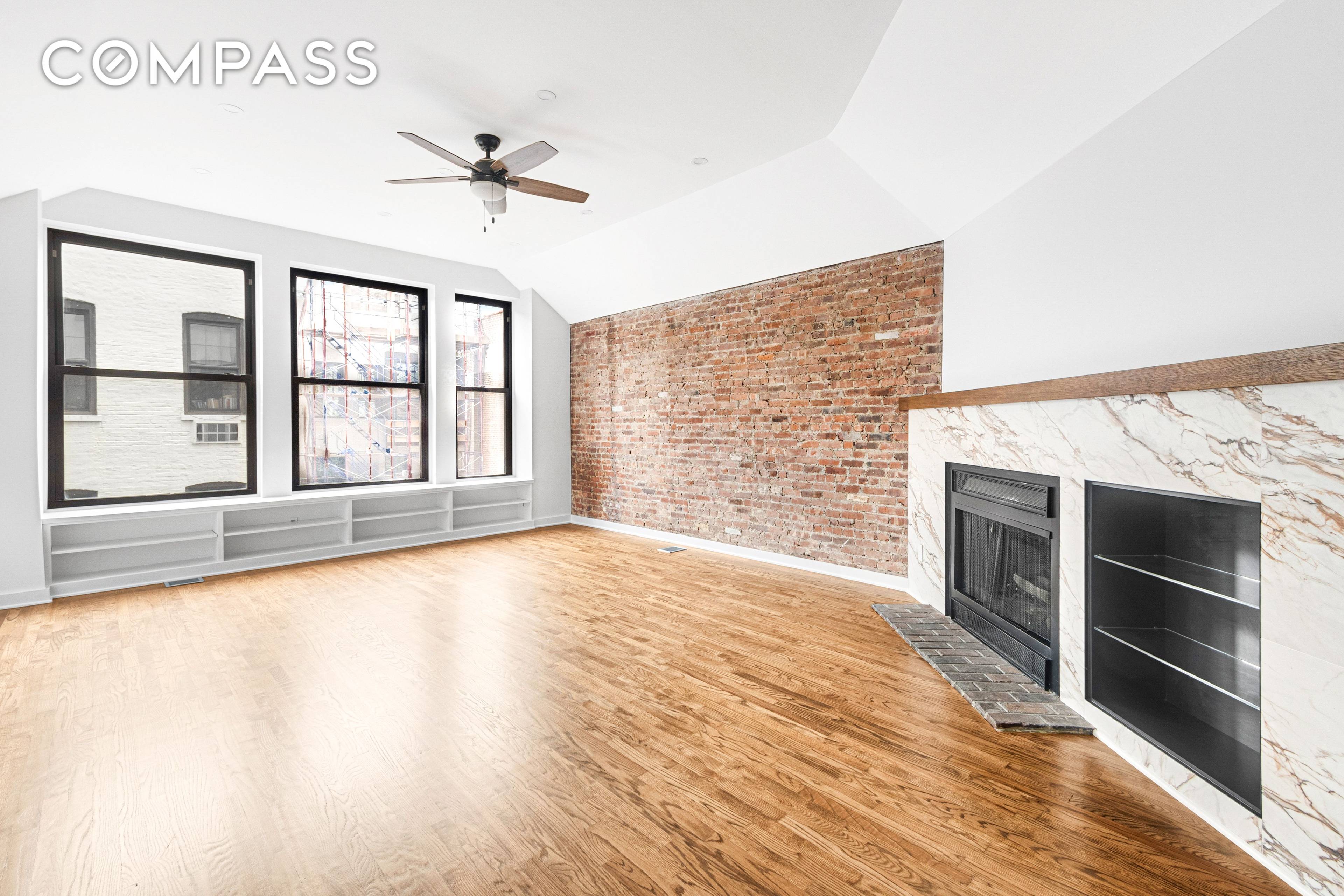 SUN SPLASHED amp ; RENOVATED, DREAMY DUPLEX w WORKING FIREPLACE amp ; CENTRAL AC Supremely located and superbly unique, this renovated home is immensely livable and lovable.