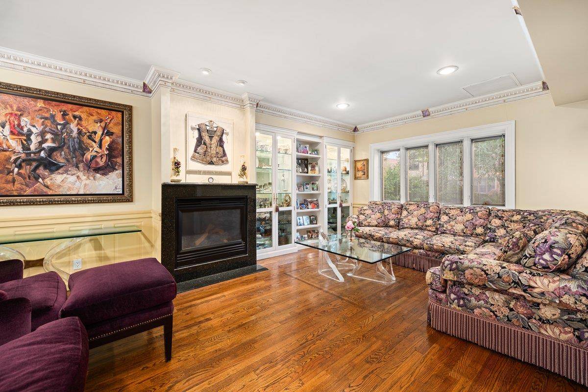 Pristine Forest Hills 20ft townhome on Harrow Street.
