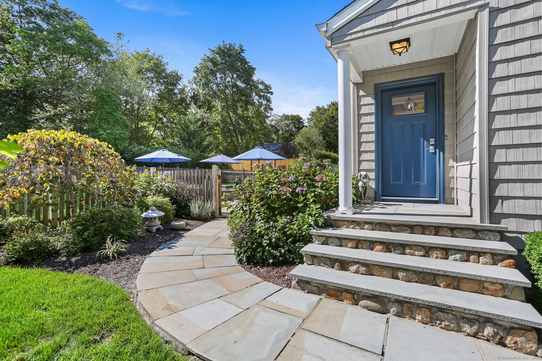 Stunning Ranch on nearly a 1 2 acre in a coveted University neighborhood on park like grounds !