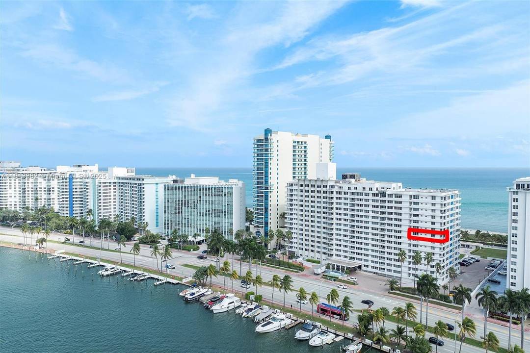 This bright 2BR 2BA corner residence captures the best of Miami Beach living with approx.