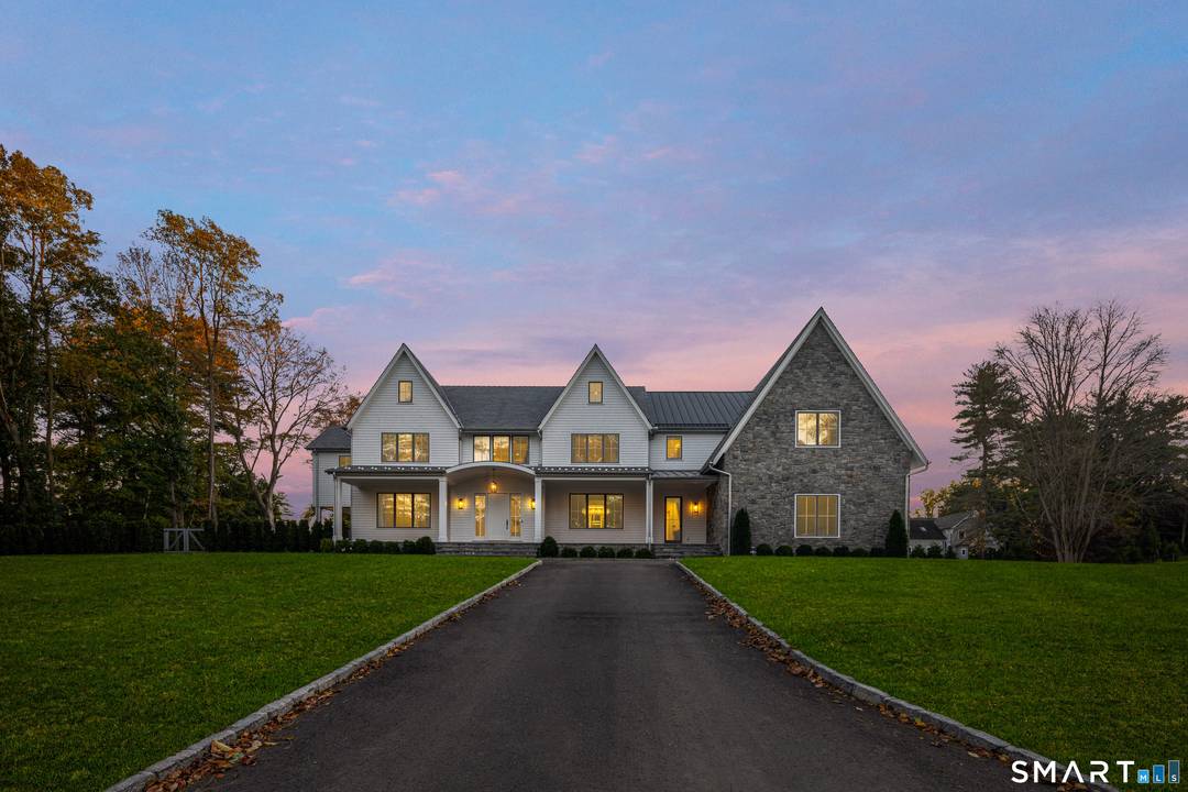 Set on a beautifully landscaped and expansive property, 28 Old Farm Road offers a rare blend of refined elegance and modern comfort.