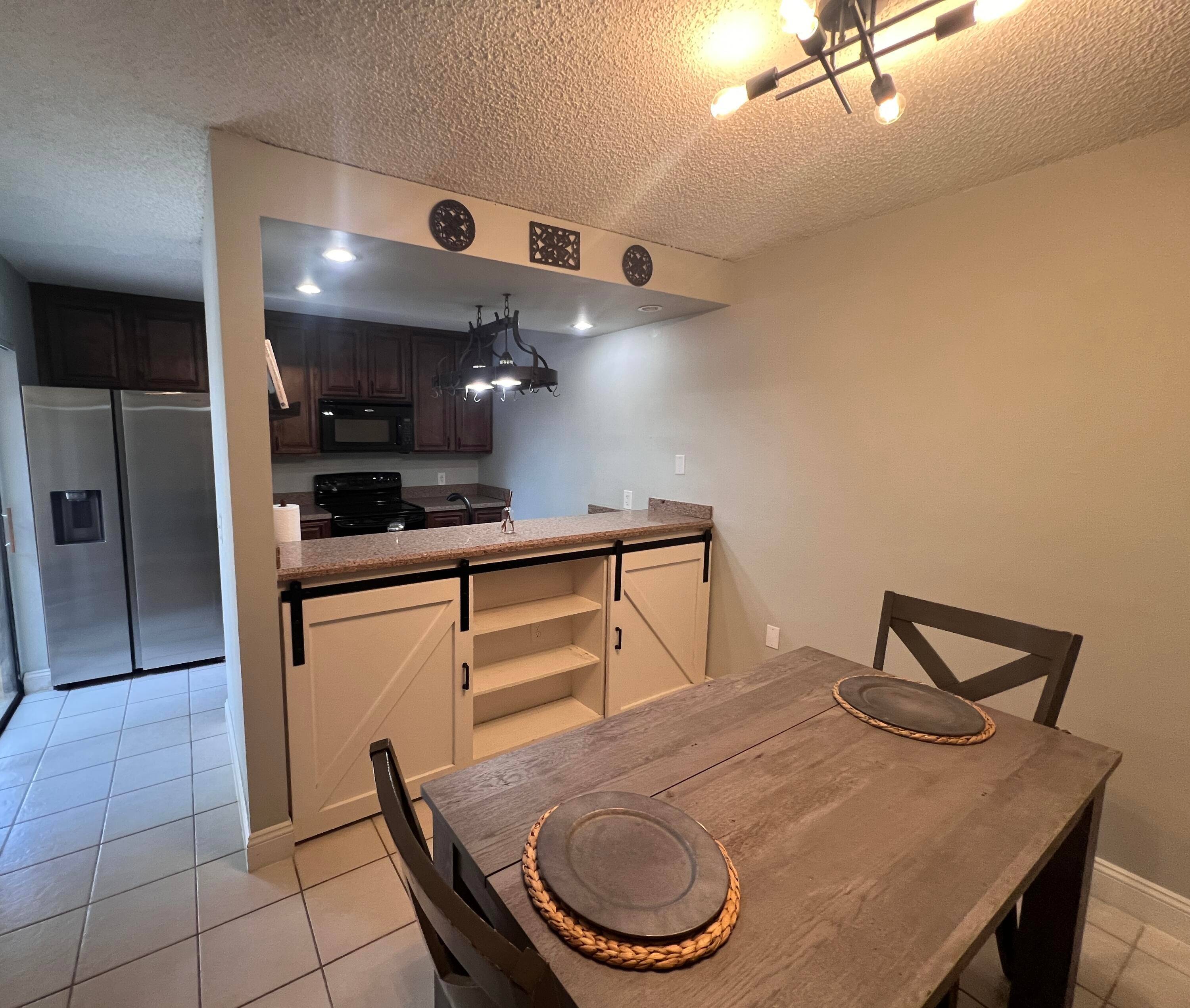 COME AND SEE THIS LOVELY TOWNHOUSE COMPLETELY UPDATED.