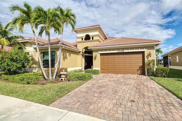 Remarkable property ! One of the largest models in Four Seasons of Parkland featuring over 3700 total square feet situated on large waterfront lot facing clubhouse !
