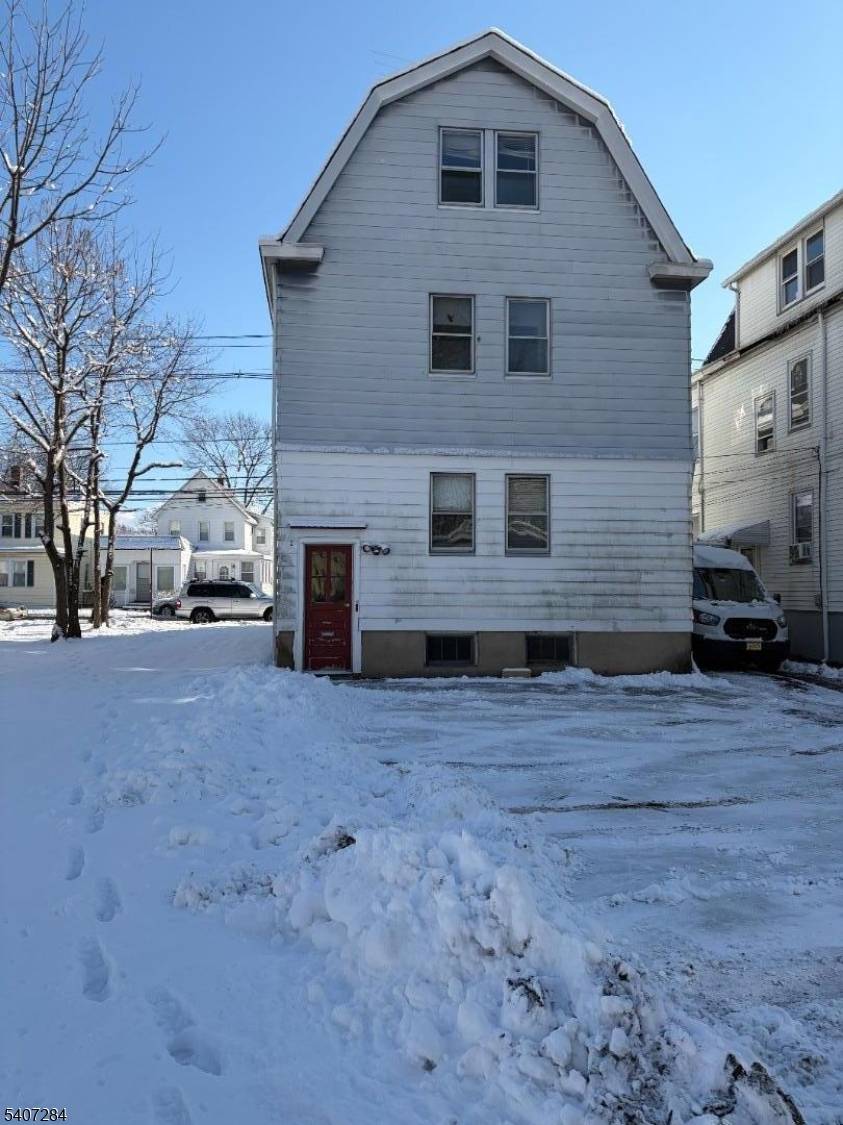 This property needs complete rehab presenting great possibilities for investors and or owner occupied with 2 apartments and a store front for a business or office.