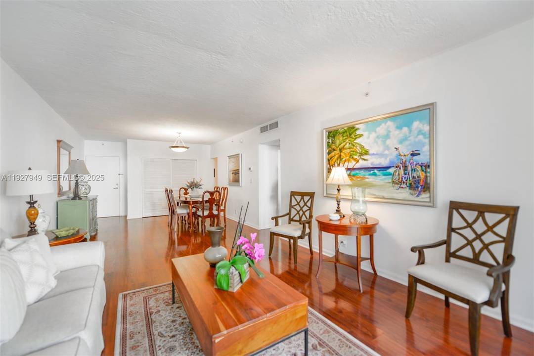 Bright 1 bedroom1. 5 baths with east exposure and ocean glimpses.