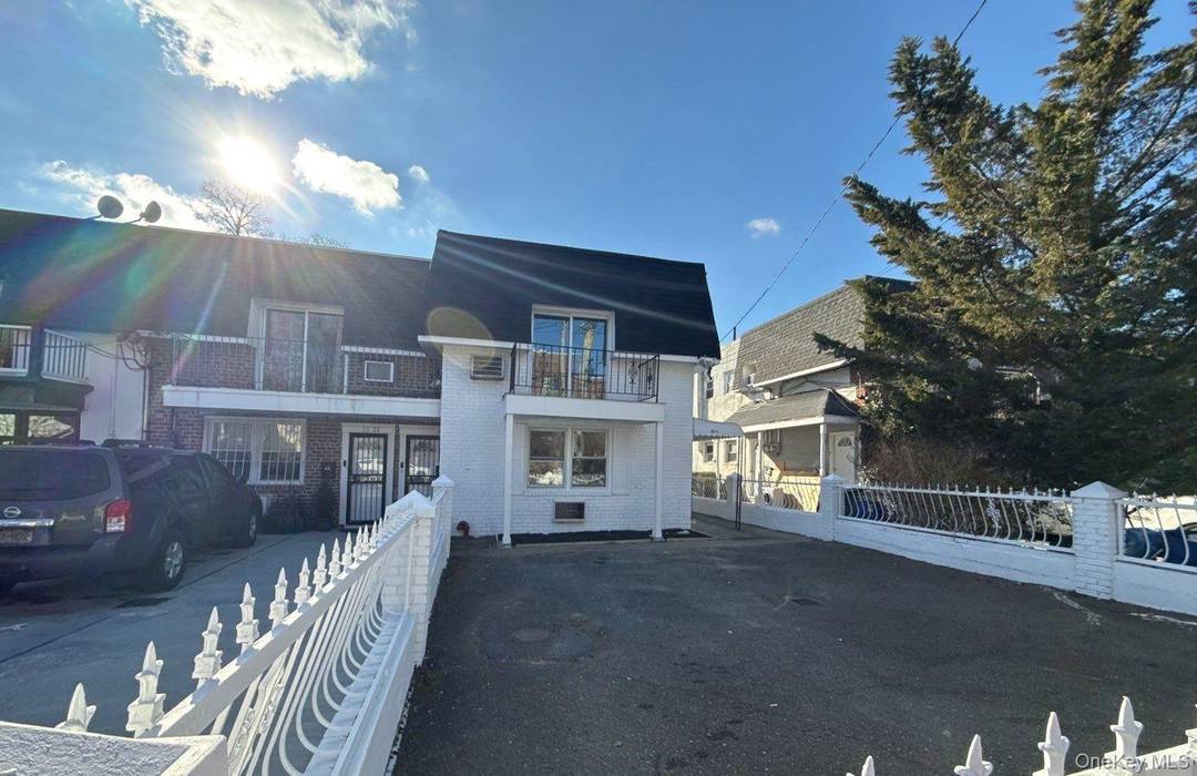 Colonial Style Home. This Home Features 6 Bedrooms, 2.