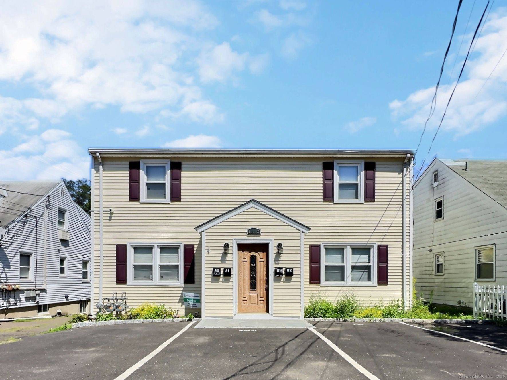 Charming Legal Two Family Home in Stamford, CT This well maintained two family residence offers a versatile living arrangement in the vibrant city of Stamford.