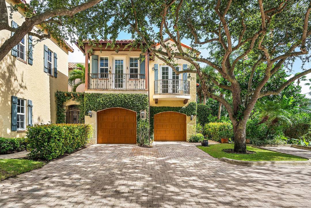 Welcome to 1031 Coralina Lane, a beautifully maintained two story Treehouse Sanctuary ideally located just one block from the prestigious Seagate Beach Club.