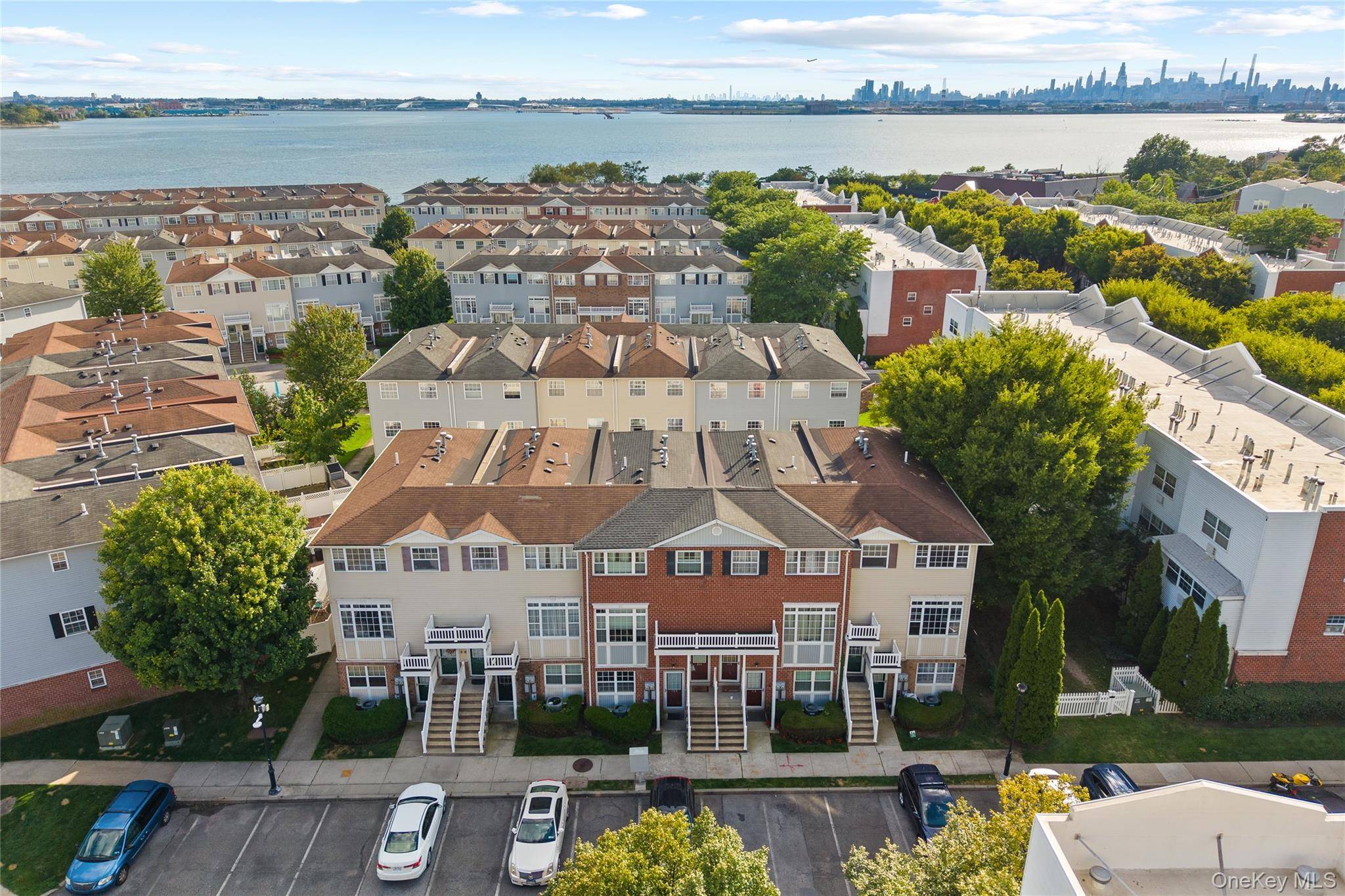 Welcome to 109 Neptune Lane, a rare 2 bedroom, 1 bath condo duplex nestled in the coveted Shore Haven waterfront community of the Bronx.