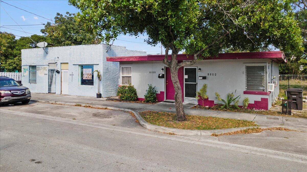 Significant Investment Opportunity Commercial storefront and residential duplex on one lot.