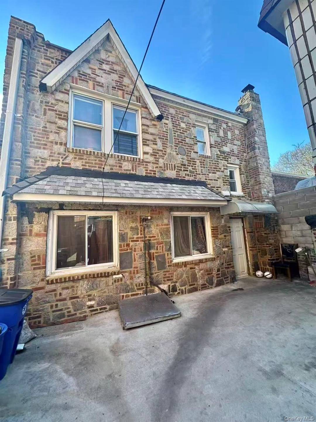 Rare legal 3 Family in the heart of Corona, featuring two separate buildings on one lot.