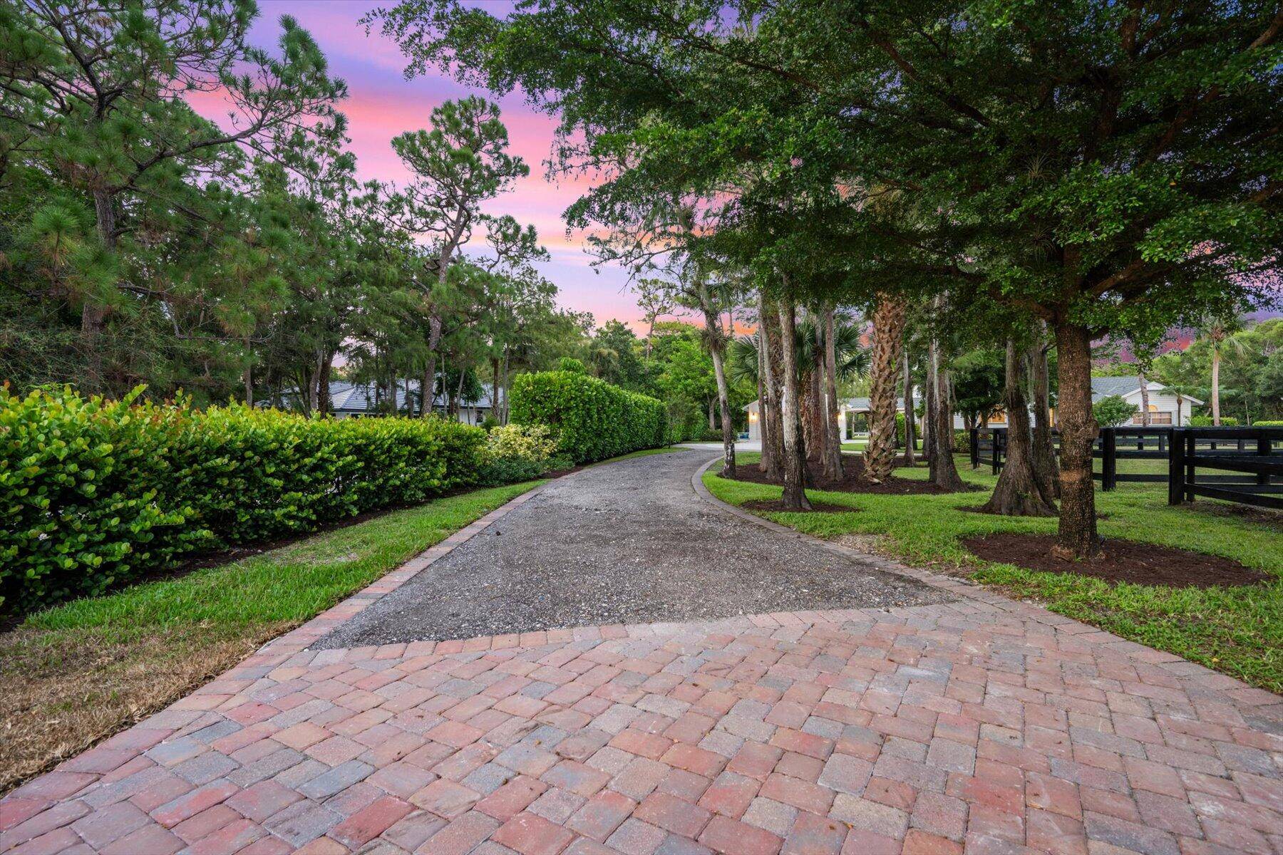 Set on just under 2. 4 acres in the highly sought after Paddock Park 2 community, this extraordinary property combines refined living with world class equestrian amenities all just minutes ...