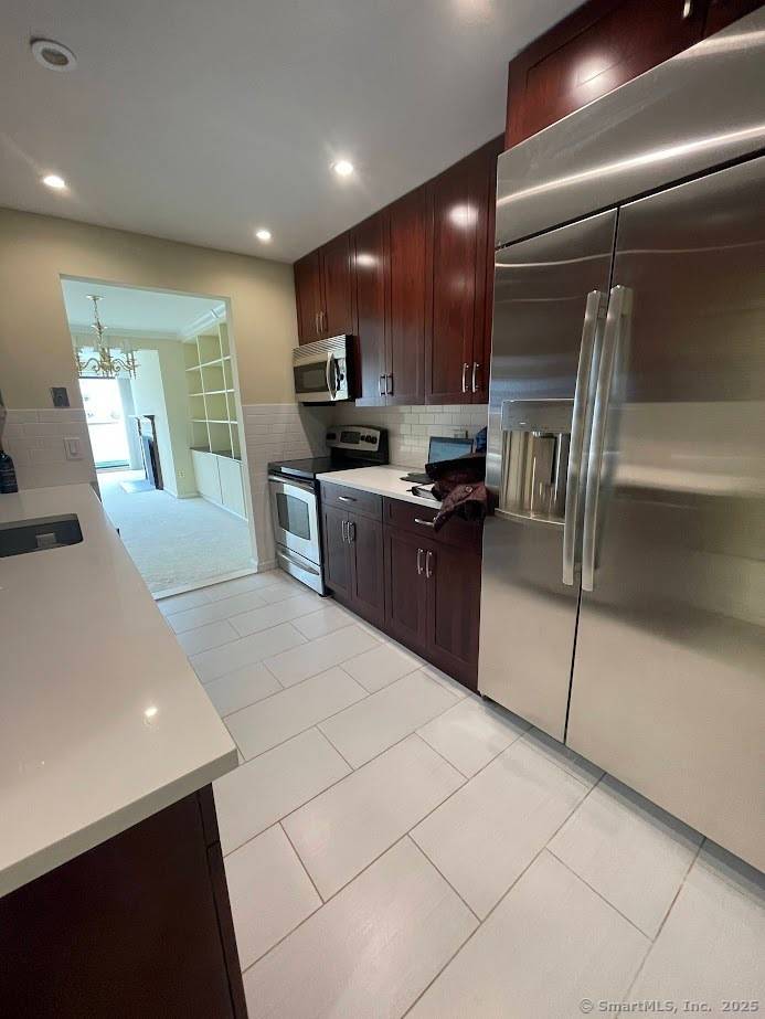 Enjoy this spacious and well maintained 2 bedroom, 2 bath located just steps from the water.