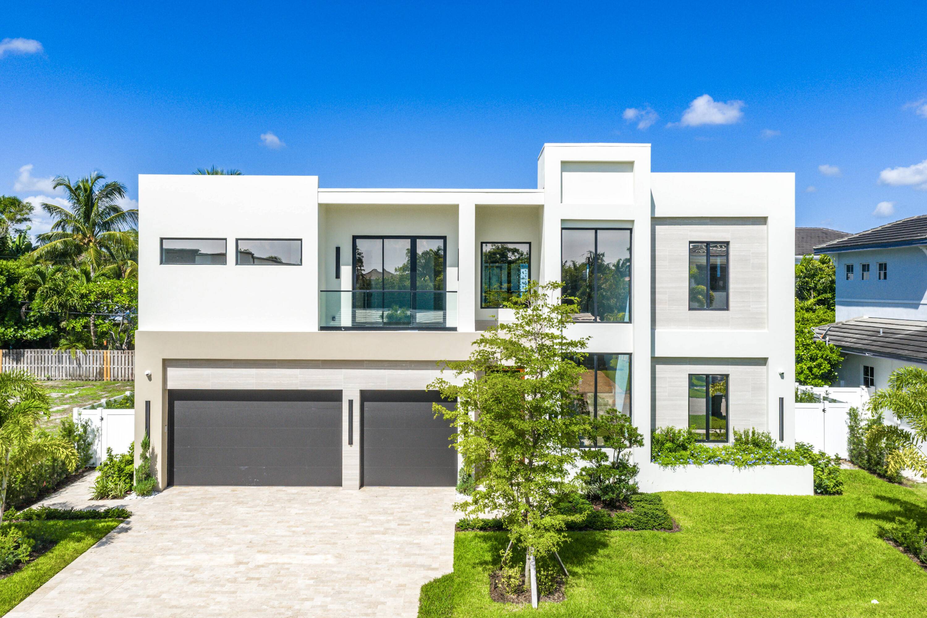 Welcome to 1031 NE 3rd Avenue, a newly constructed residence in the highly sought after Boca Villas neighborhood, crafted by Skymar Custom Homes.