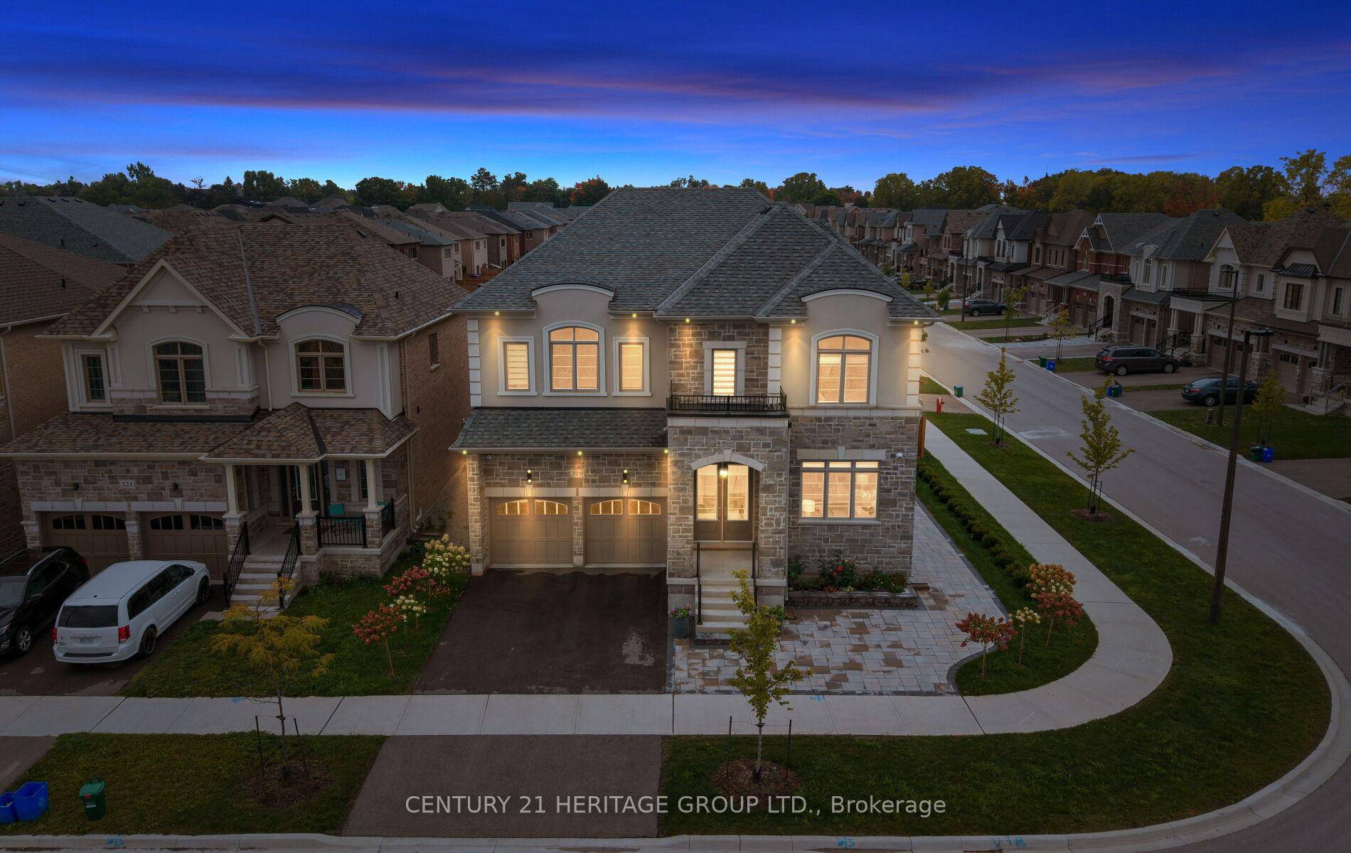 Welcome to 319 Danny Wheeler Boulevard, a showpiece executive home in the heart of Keswick North, just minutes from Lake Simcoe.