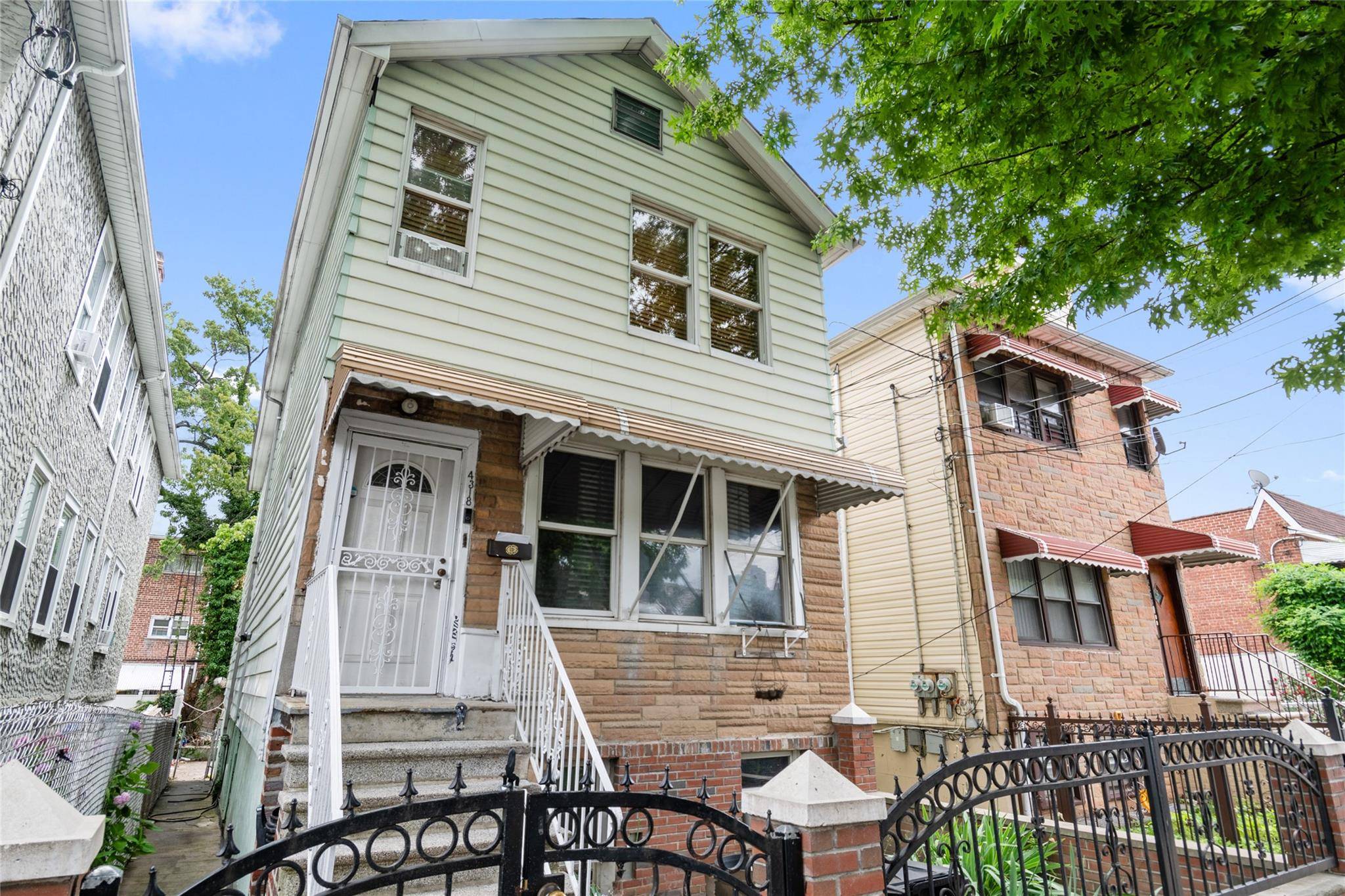 Legal 2 family 2nd fl 2bdrm apt is well lit and boasts of recently designed open concept w wood floors throughout, high ceilings amp ; recessed lighting.