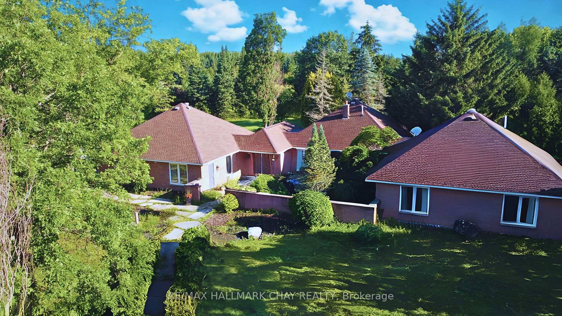 STUNNING NEARLY 50 ACRE PROPERTY WITH BUSINESS AND IN LAW POTENTIAL !