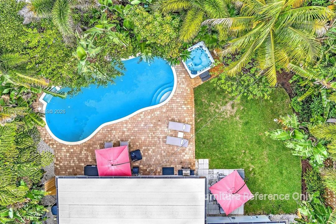 This spacious 4 bedroom, 2 bathroom home in Coral Heights features a convenient circular driveway and offers NO HOA with no rental restrictions.