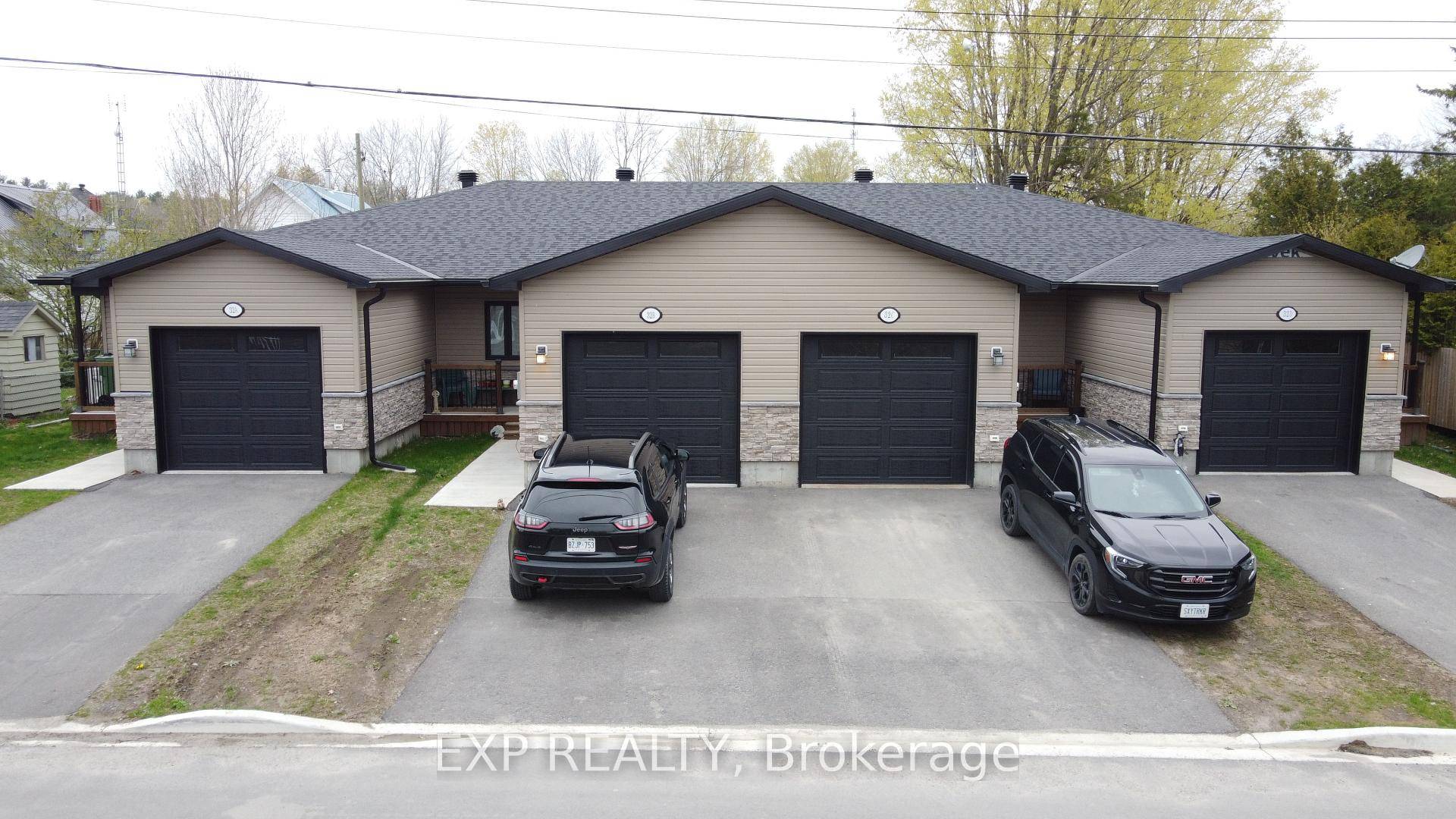 Attention investors ! ! Rarely offered purpose built Fourplex in Spencerville featuring four individually titled 2 bed, 1.