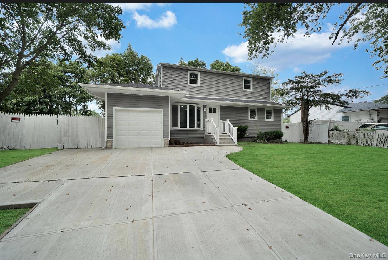 welcome to this beautiful gut renovated house in heart of the bustling hamlet of central Islip.