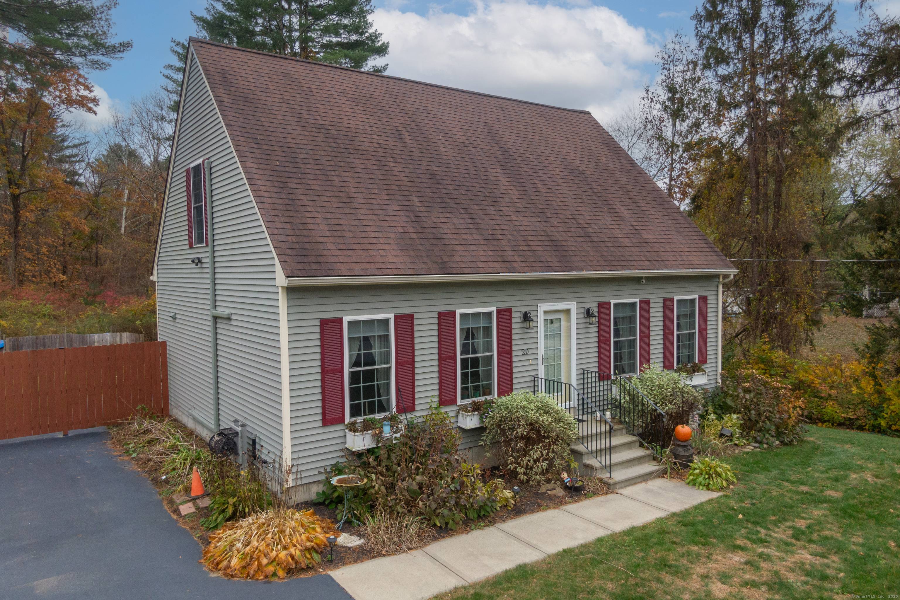 This delightful Cape Cod style home, with its four bedrooms and two bathrooms, truly embodies the essence of homeownership pride, characterized by its warmth and inviting charm.