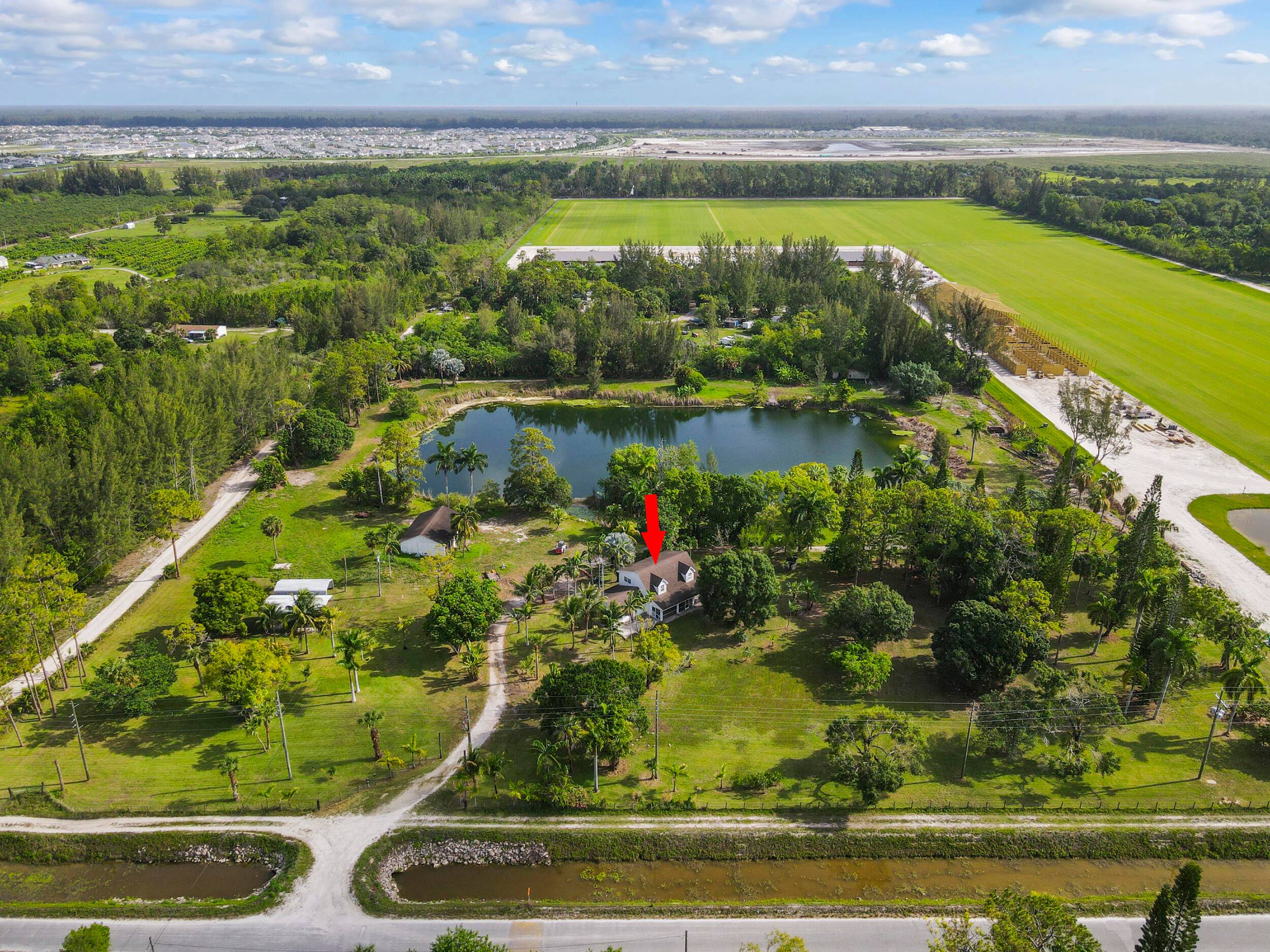 Potential Galore 10 acre beautifully manicured property with a 1900 sq ft main home w 3 bedrooms, 2 baths, spacious loft, 2 car garage, PLUS a detached 1350 sq ft ...