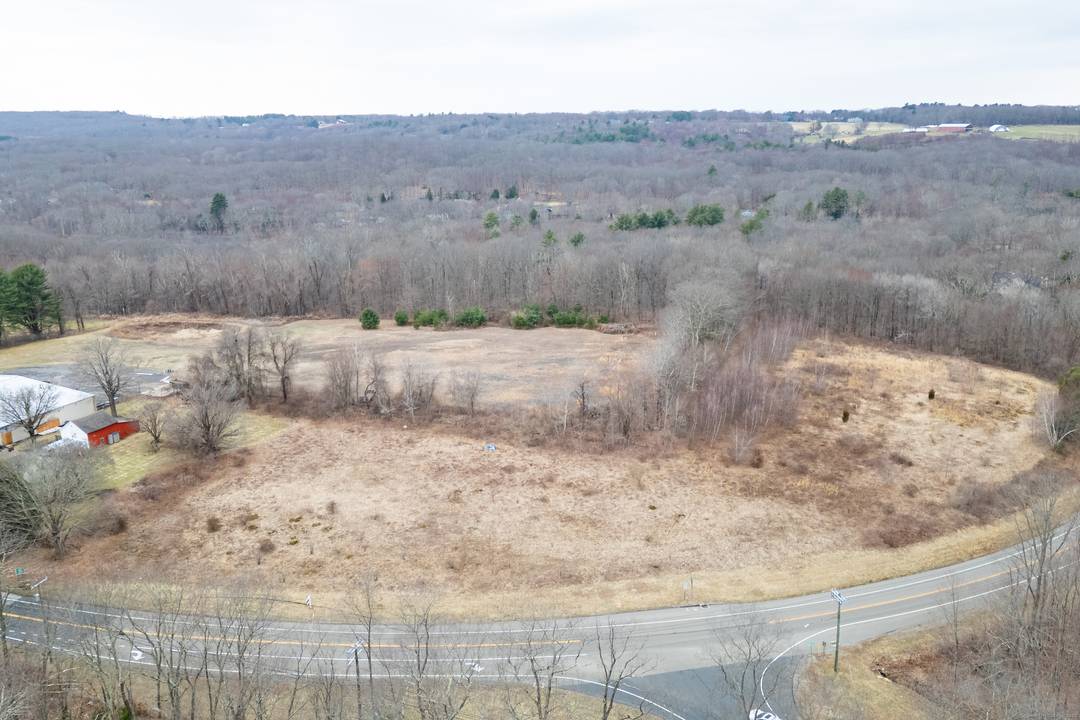 An undeveloped, dry, portion of a parcel located at 1 West Street, Bolton, CT, also known as Rt 85 shown as proposed Lots 3, 4 and 5, in the attached ...