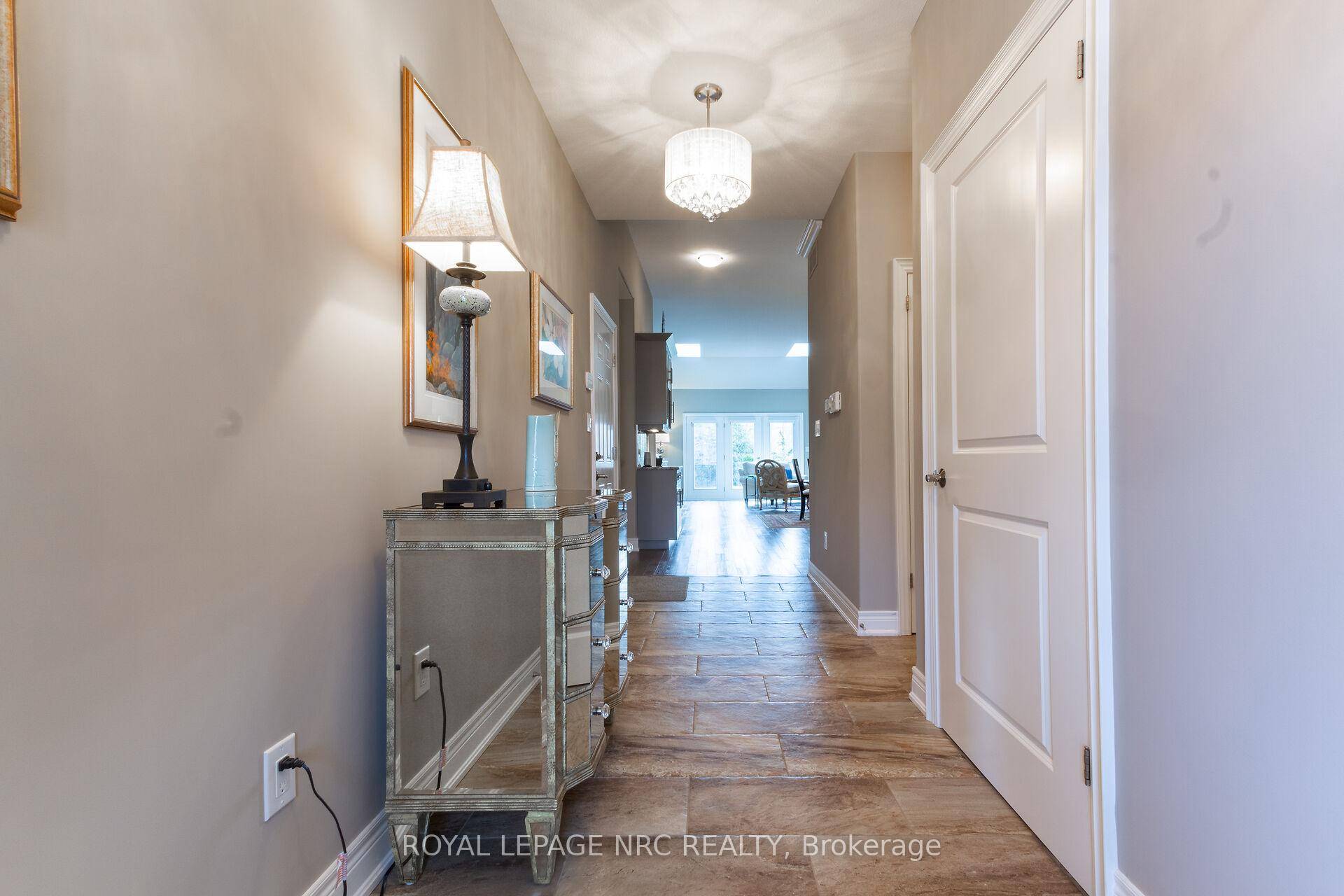 A LUXURIOUS RETREAT ! Pride of ownership definitely shows as you tour this previous model home owned by only one owner !
