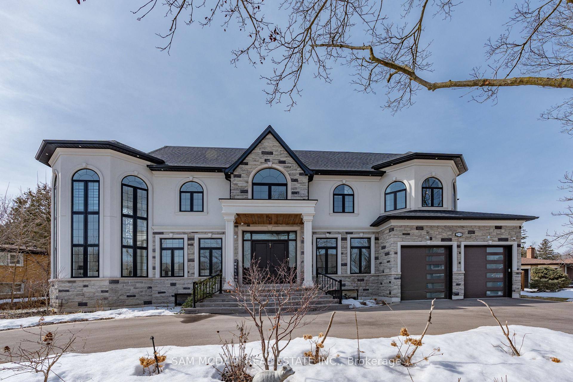 Welcome to 2554 Liruma Rd, a custom designed estate crafted home in sought after Sheridan Homelands.
