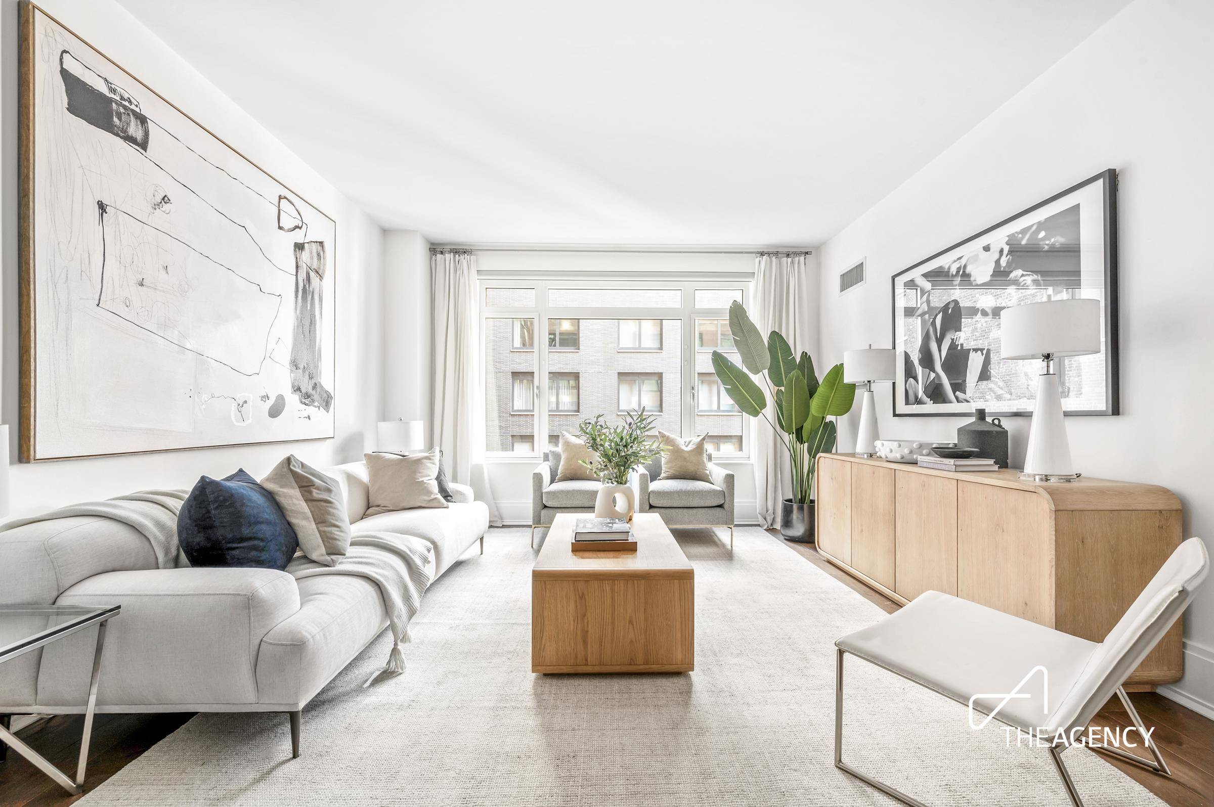 Presenting a refined two bedroom, two bathroom residence in the sought after Harrison Condominium, designed by Robert A.