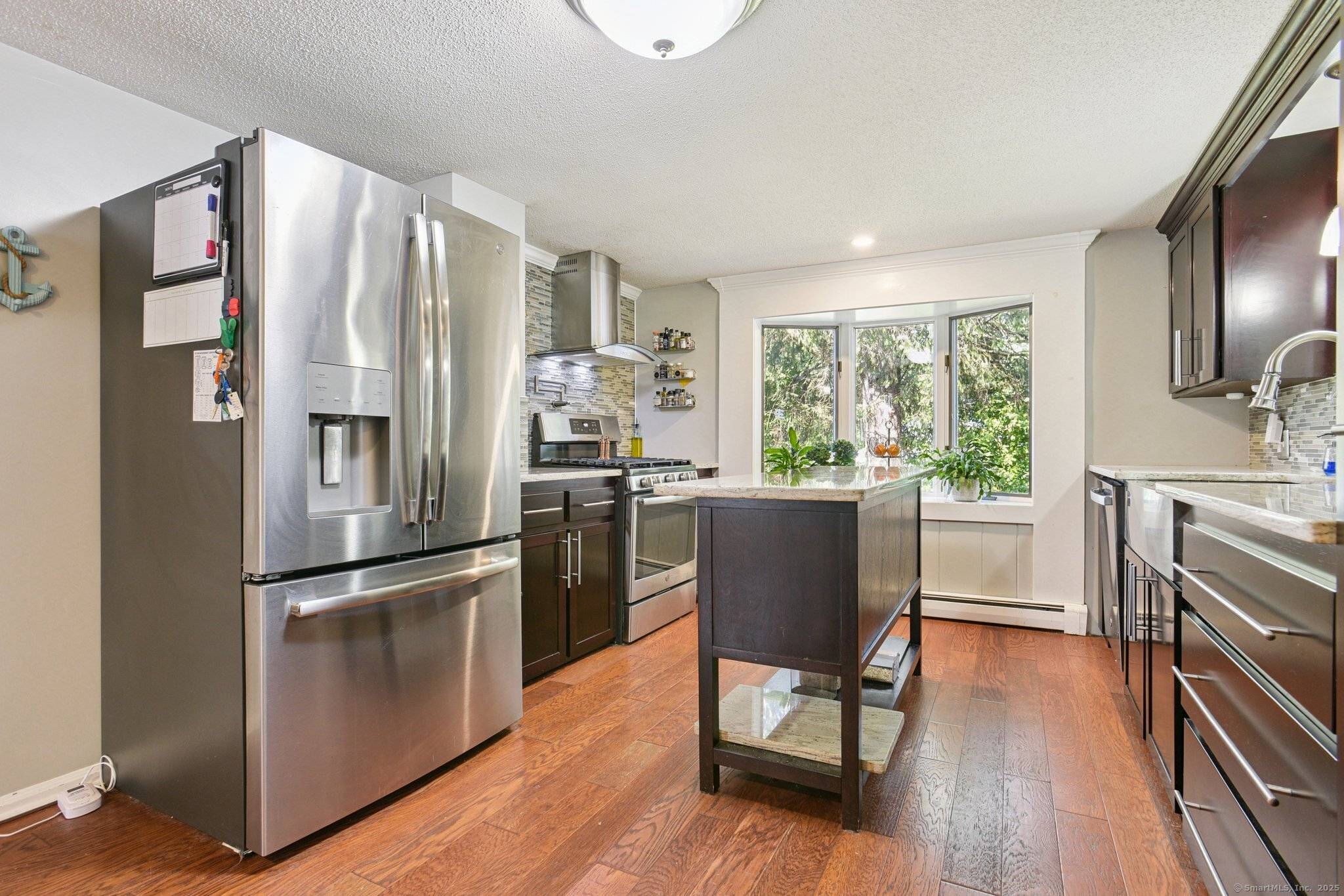 Welcome to 7 Rocky Ledge Drive in Clinton, CT a charming and beautifully updated 4 bedroom, 1 bath home sitting on an oversized double lot that offers space, privacy, and ...
