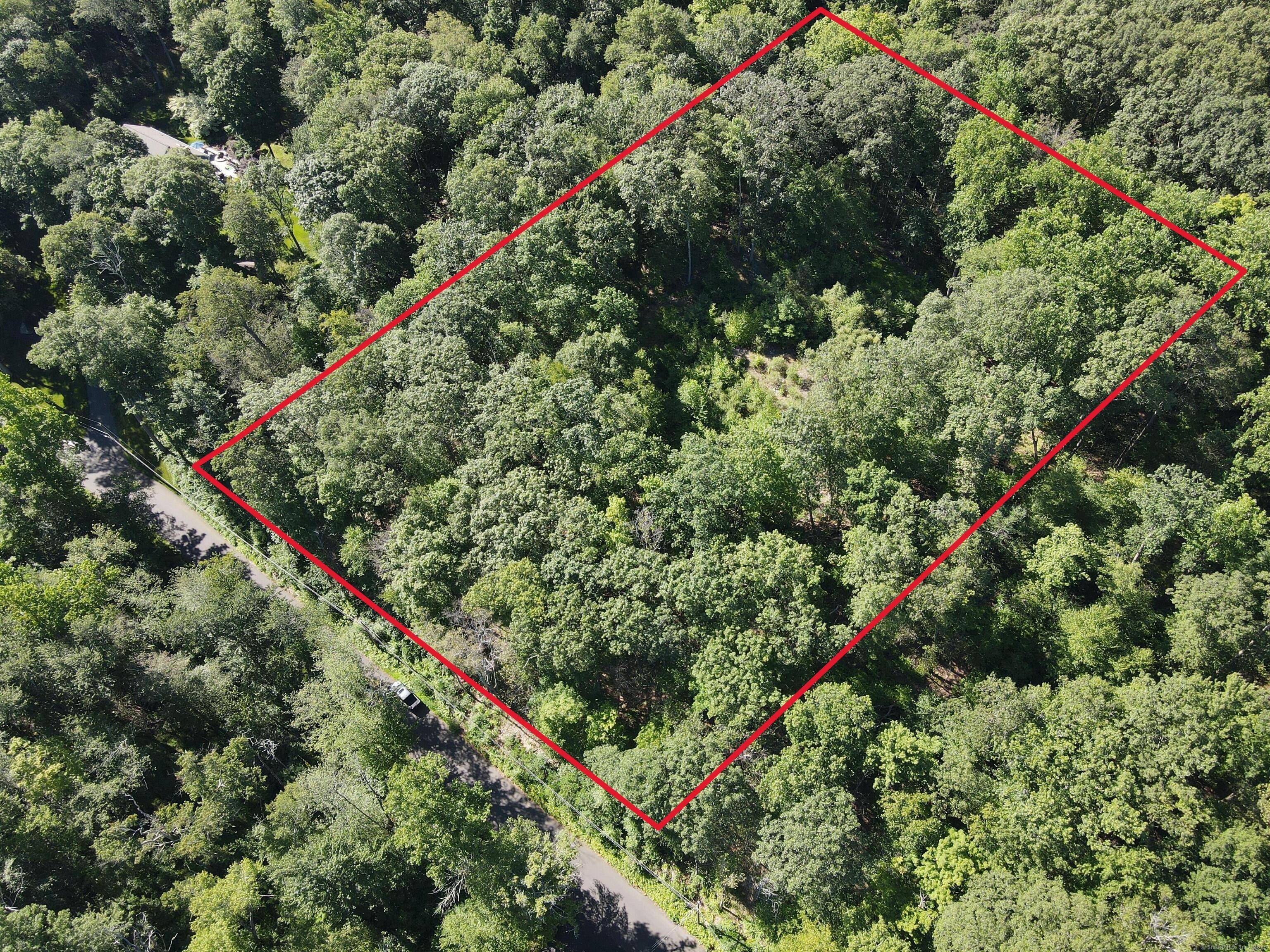 Here's your opportunity to own an amazing 2 acre property nestled in the heart of Ridgefield, CT, in Fairfield County.