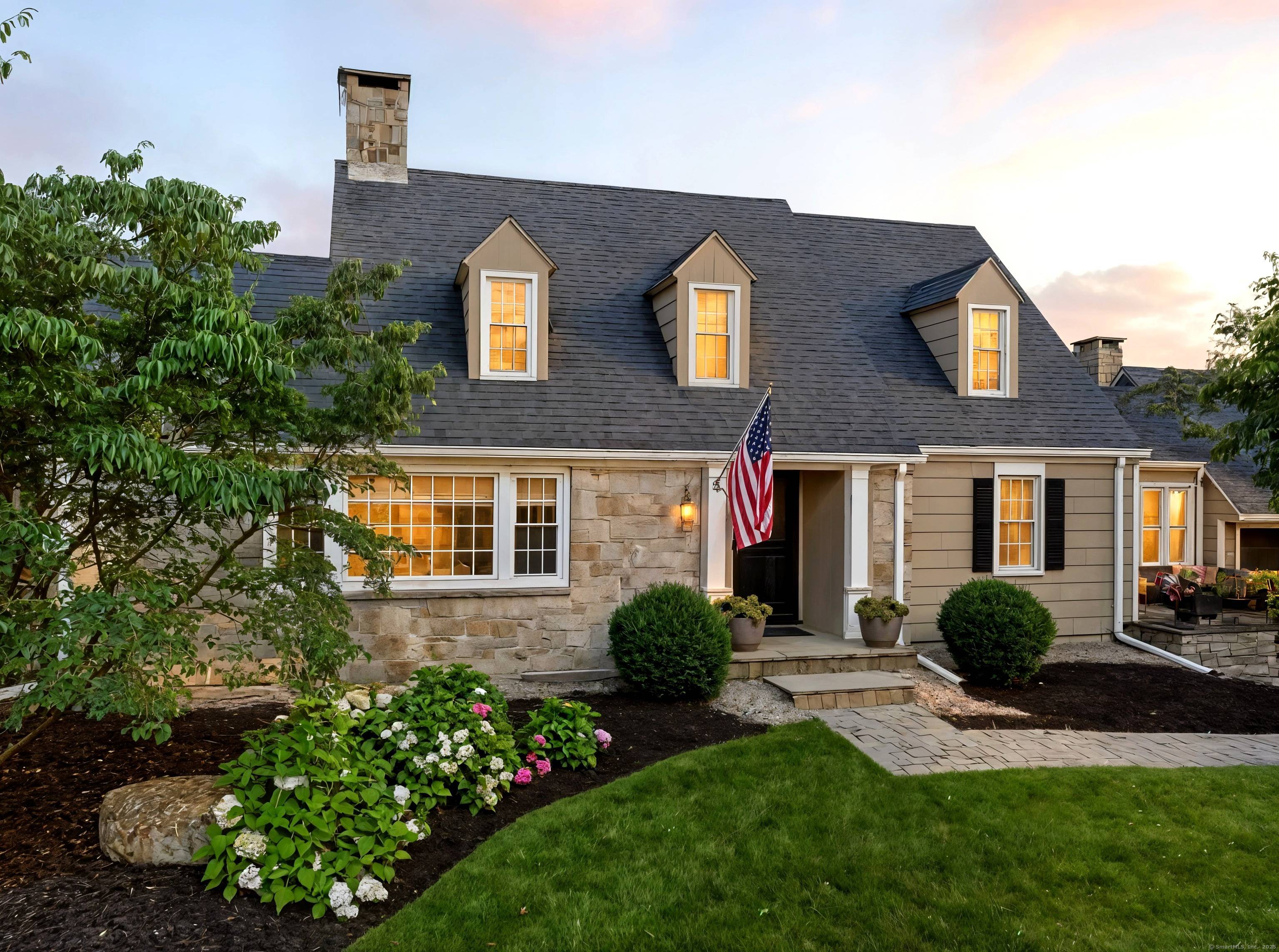 Stunning Prentiss designed Cape on coveted Hunter Drive !