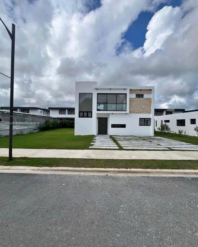 Discover the perfect balance between luxury and nature in this exclusive villa within Vista Cana.