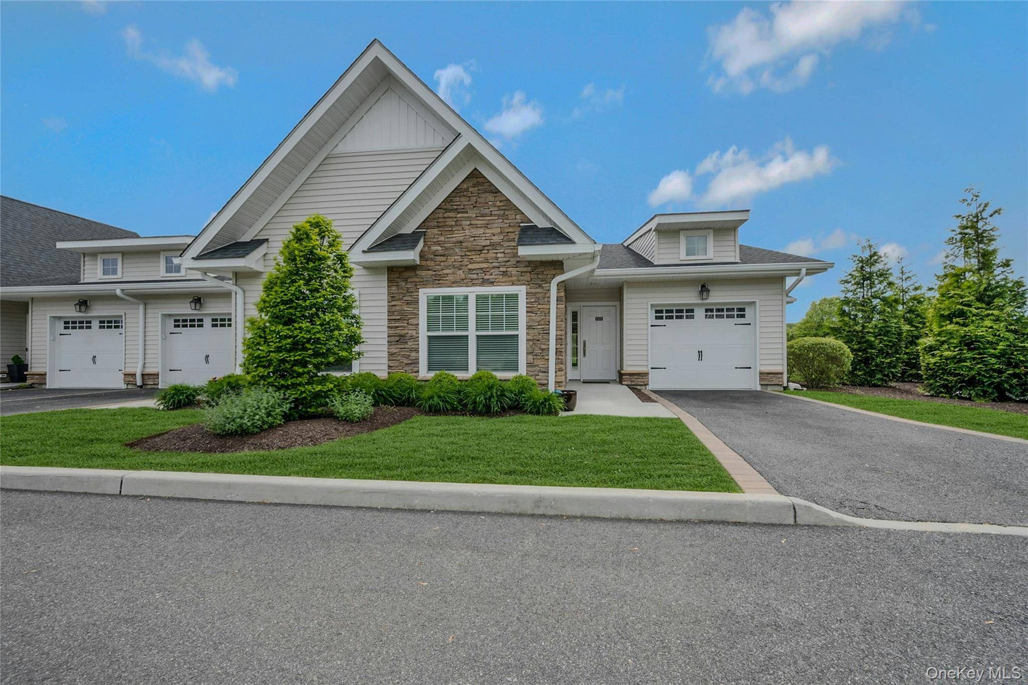 Welcome to 1101 Fox Hill, One of a kind corner villa located in Baiting Hollow Vista's.