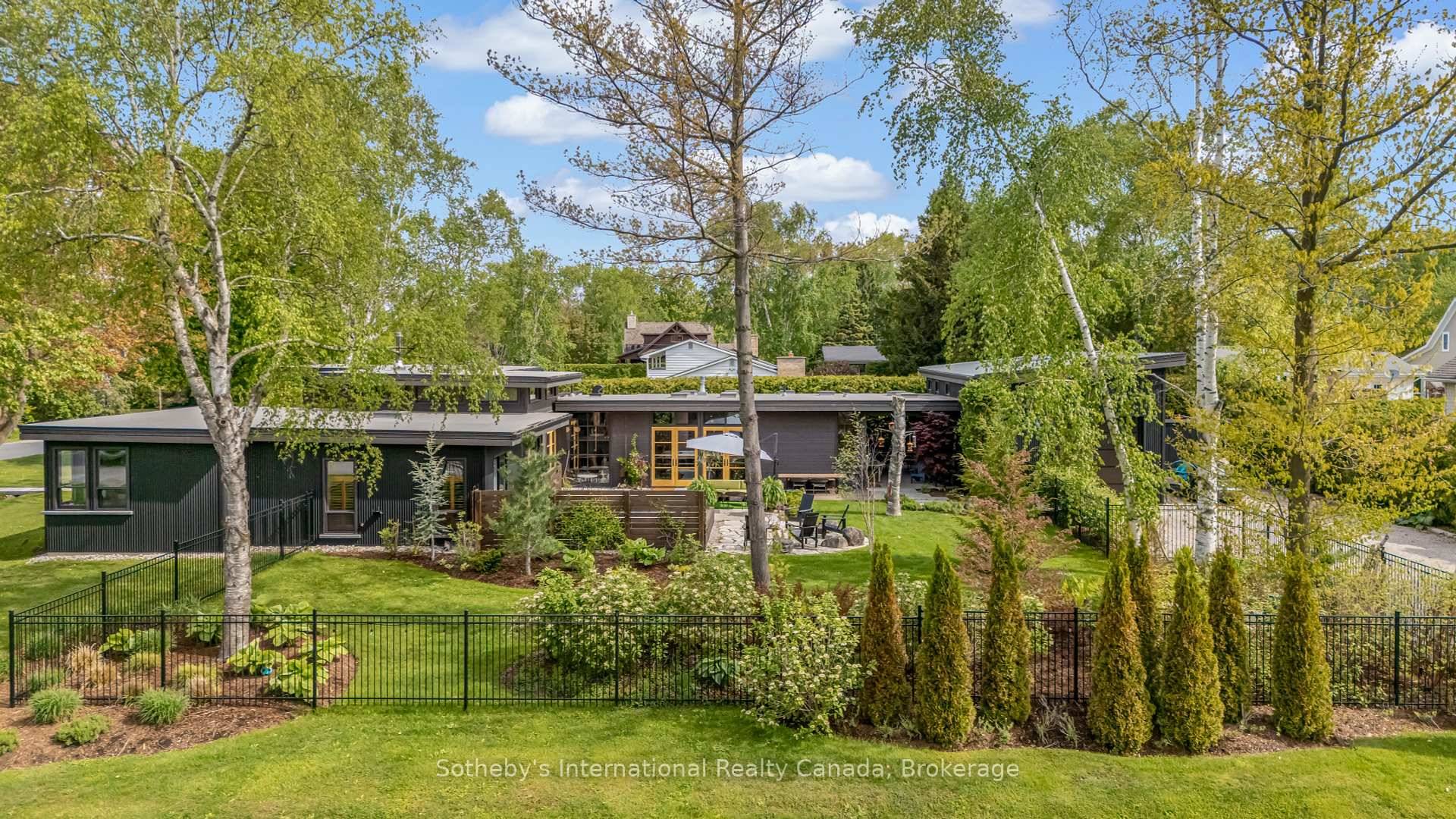 Stunning architecturally designed, 3 bedroom, 3 bath custom home offering over 3, 000 sq ft of refined living space on a rare double corner lot just steps from the shores ...