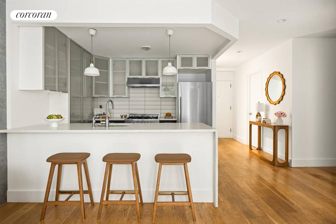 Presented by The Miller Markowicz Team One of a Kind Triplex with Private Parking The Williamsburg Unicorn Experience modern living in this stunning 1, 569 sq ft triplex condo that ...