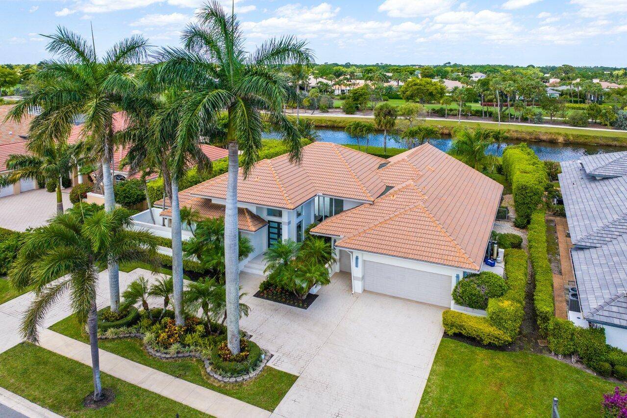 Thoroughly and thoughtfully renovated over a two year period, this extraordinary property was developed by one of Boca's premier designer builders, and transformed into an oasis of modern living.