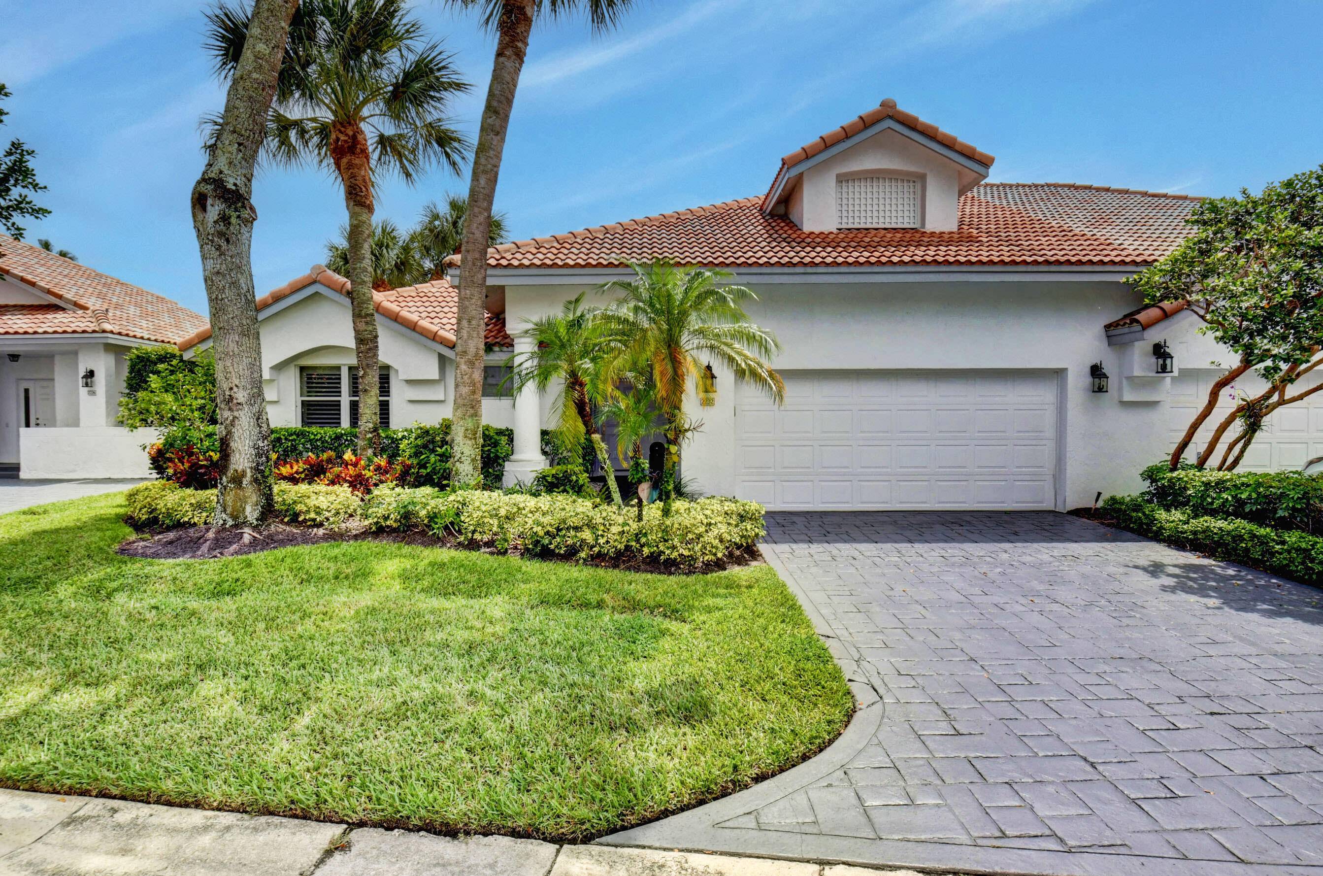 Nestled among majestic palm trees with a pristine manicured landscape, this 2 bed 2.