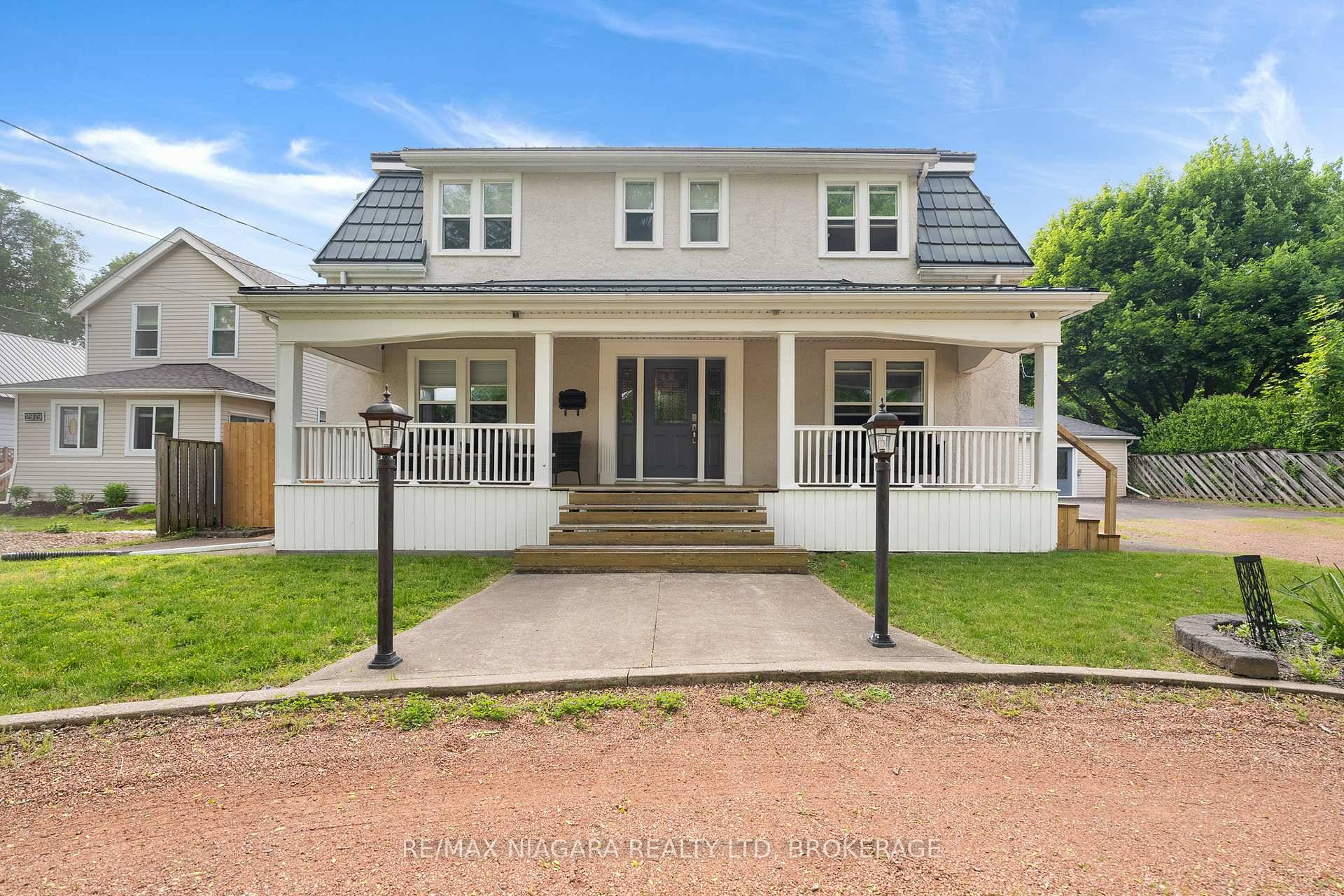 Discover this rare gem featuring two homes, a truly unique opportunity offering endless possibilities for multi generational living or investment income.