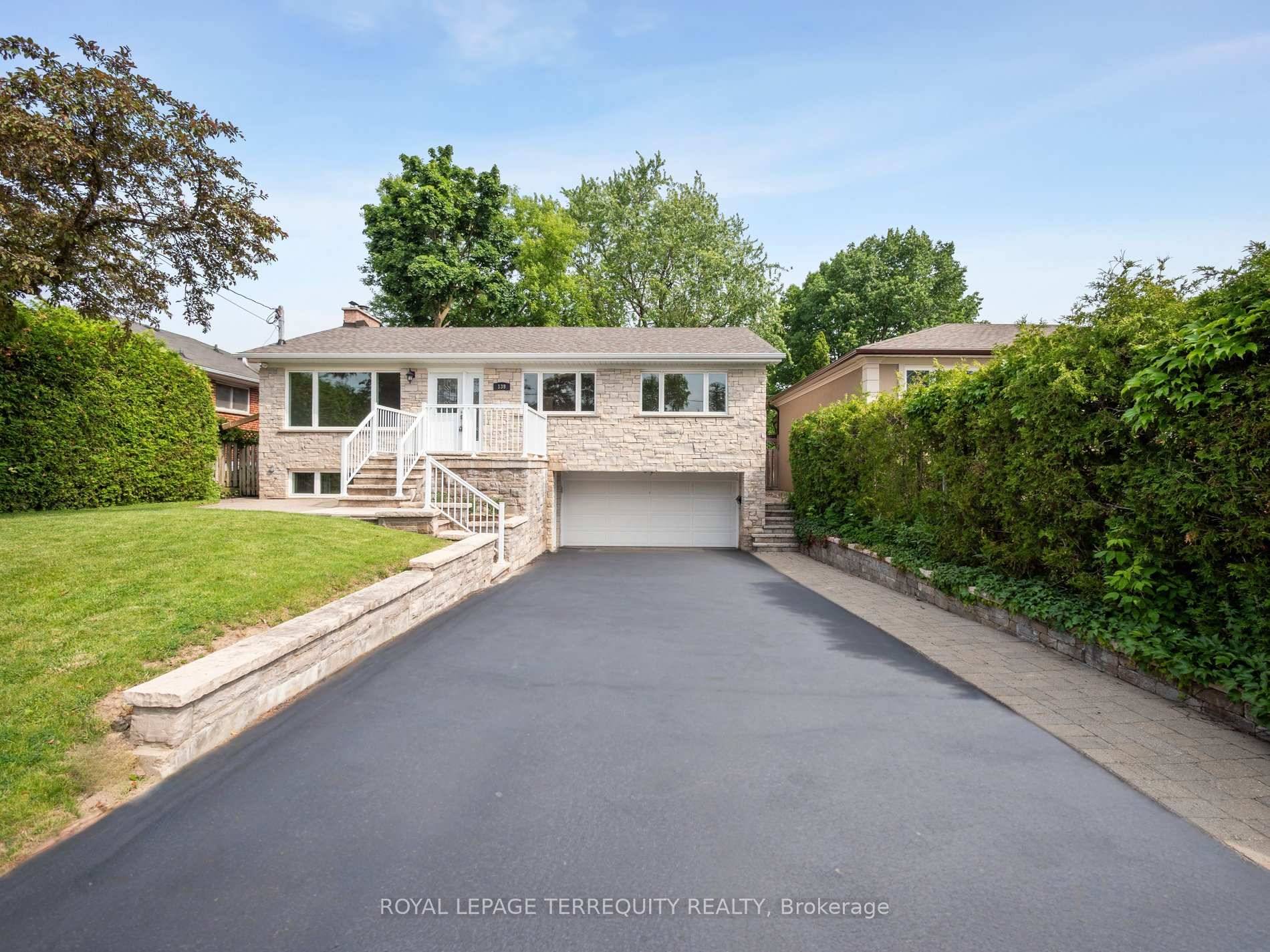 Welcome To This Beautiful Mill Pond Residence on a Rare Premium Lot Nestled Among Lush Cedar Trees.