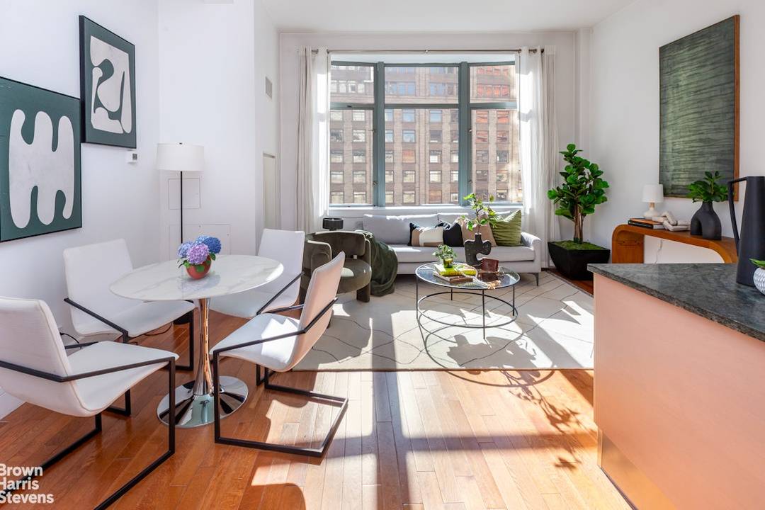 As soon as you enter this home, you're greeted with soaring 11ft ceilings, oversized East facing windows and amazing room proportions and layout.