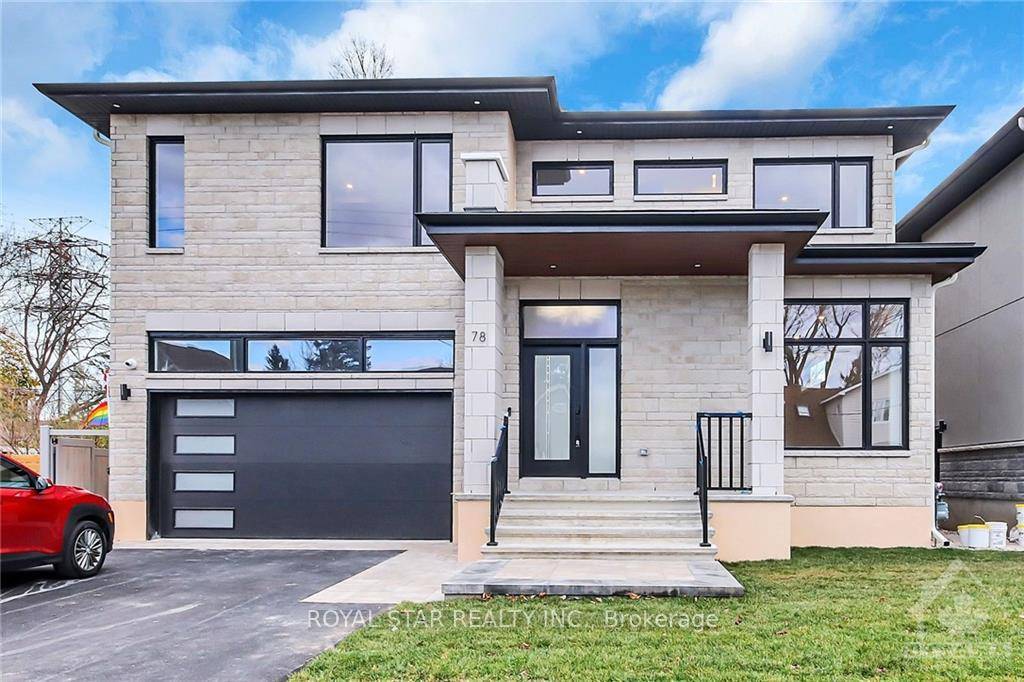 Luxurious custom built home in Saint Claire Gardens, immediately charming you with its curb appeal, stonework, design, and craftsmanship.