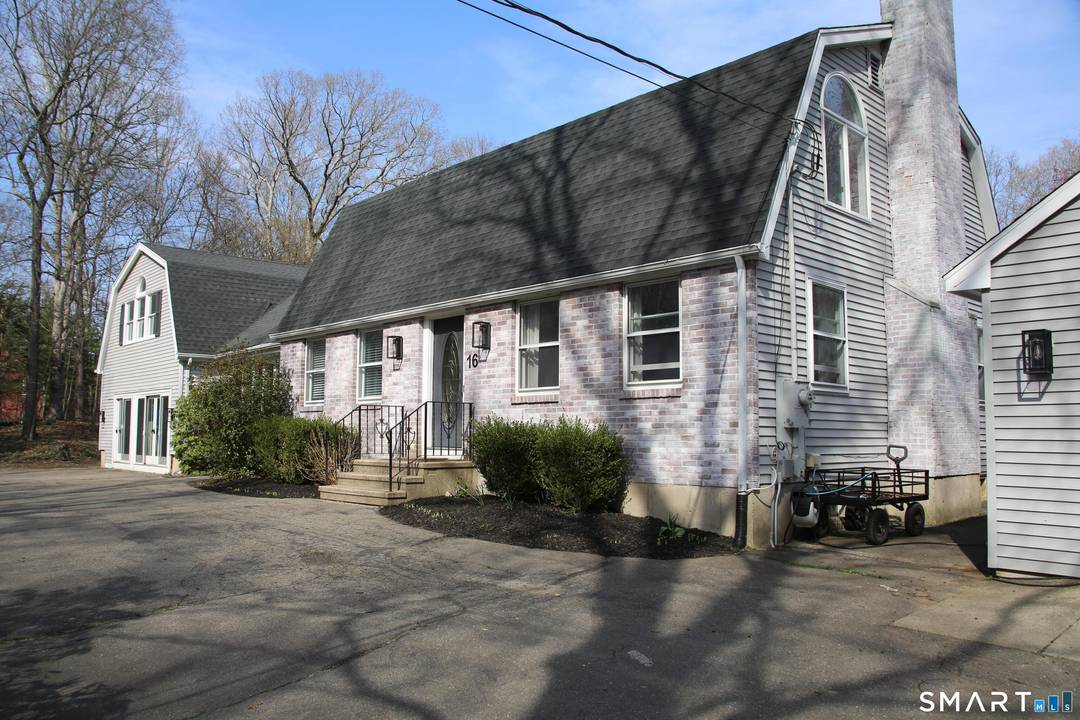 Oversized colonial with a unique layout, gourmet kitchen, and potential in law setup with over 5, 000 sq ft of living space.