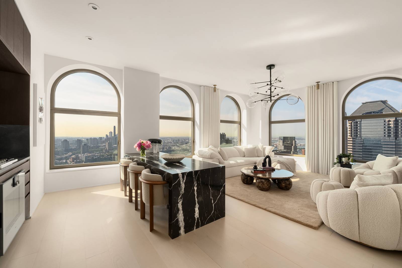 Set high above the city on the 55th floor of 130 William, this exceptional one bedroom, one and a half bath corner residence is wrapped in seven oversized windows with ...